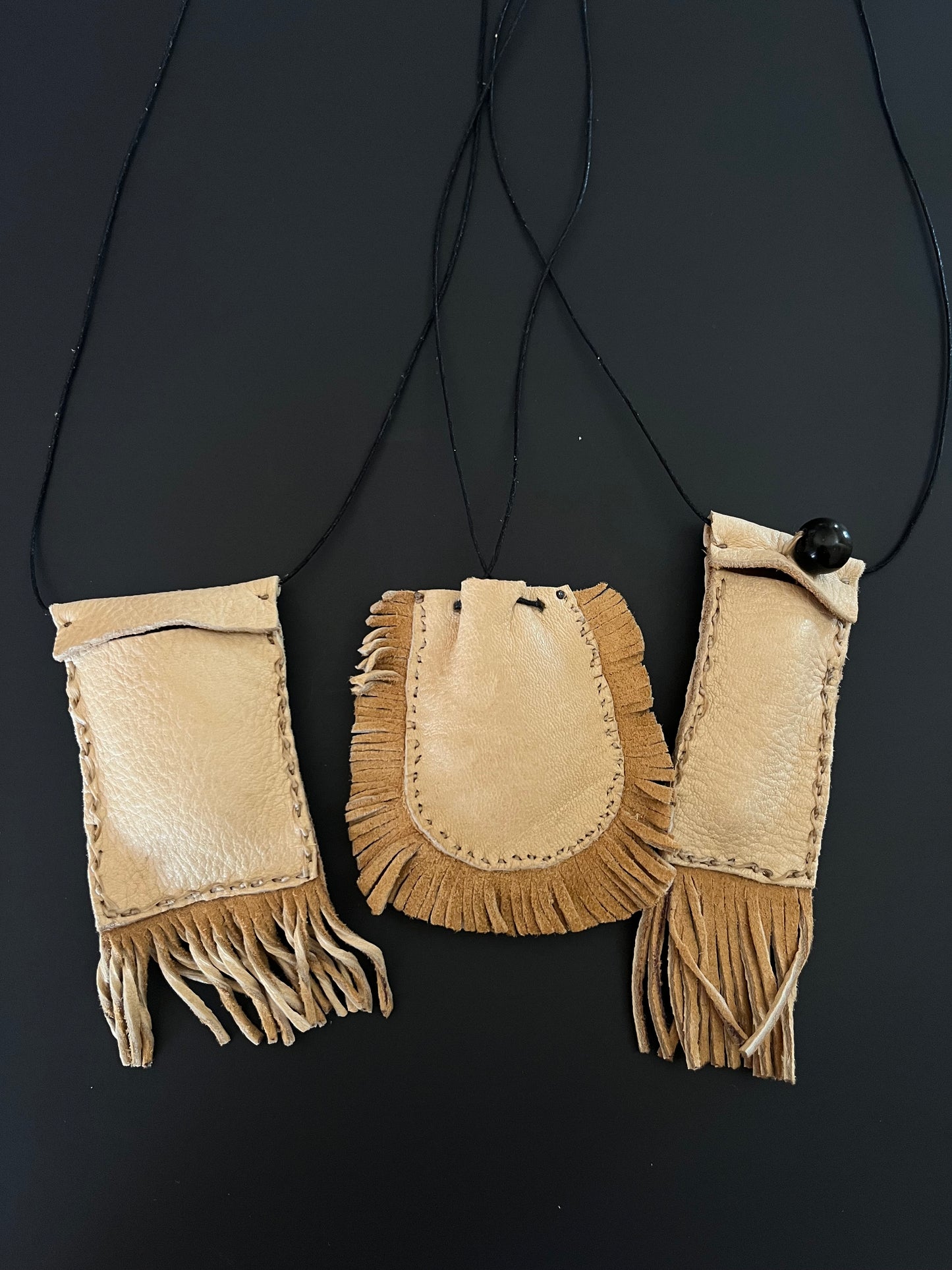 Elk Hide Talisman Fringe Corded Crossbody Pouches